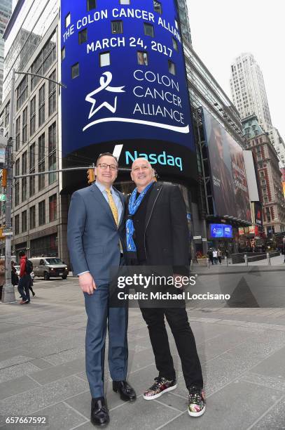 Vice President Joseph Brantuk and Fashion designer Carmen Marc Valvo pose outside NASDAQ after ringing the Nasdaq Stock Market Opening Bell at NASDAQ...