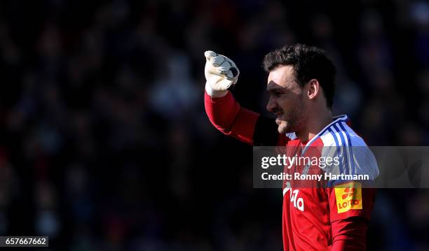 Goalkeeper Kenneth Kronholm of Kiel gestures during the Third League match between Holstein Kiel and 1. FC Magdeburg at Holstein-Stadion on March 25,...