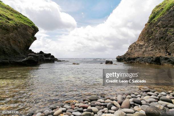 rocky shore - batan location stock pictures, royalty-free photos & images