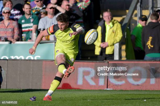 Owen Williams of Leicester Tigers kicks a long-distance penalty to win the game during the Aviva Premiership match between Northampton Saints and...