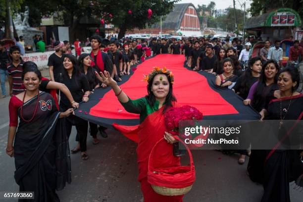 Prachyanat School of Acting and Design will take out a procession Lal Jatra, to observe the dark night of March 25, 1971 in Dhaka, Bangladesh on...