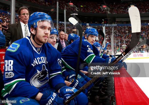 Nikita Tryamkin of the Vancouver Canucks looks on from the bench during their NHL game against the New York Islanders at Rogers Arena March 9, 2017...