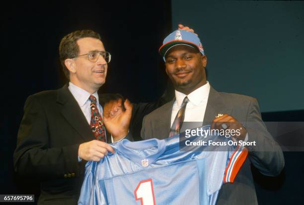 Commissioner Paul Tagliabue stands with Steve McNair the number 1 draft pick of the Houston Oilers in the 1995 NFL draft April 22, 1995 at Madison...