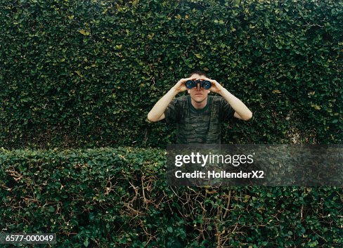 Man Using Binoculars Man Using Binoculars