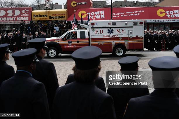New York City fire department EMT workers attend the funeral of colleague Yadira Arroyo is brought into St. Nicholas of Tolentine R.C. Church in the...