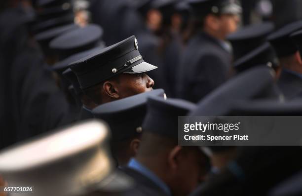 New York City fire department EMT workers attend the funeral of colleague Yadira Arroyo is brought into St. Nicholas of Tolentine R.C. Church in the...