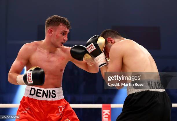 Rodavan Denis Rodavan of Germany and Atin Karabet of Germany exchange punches ...