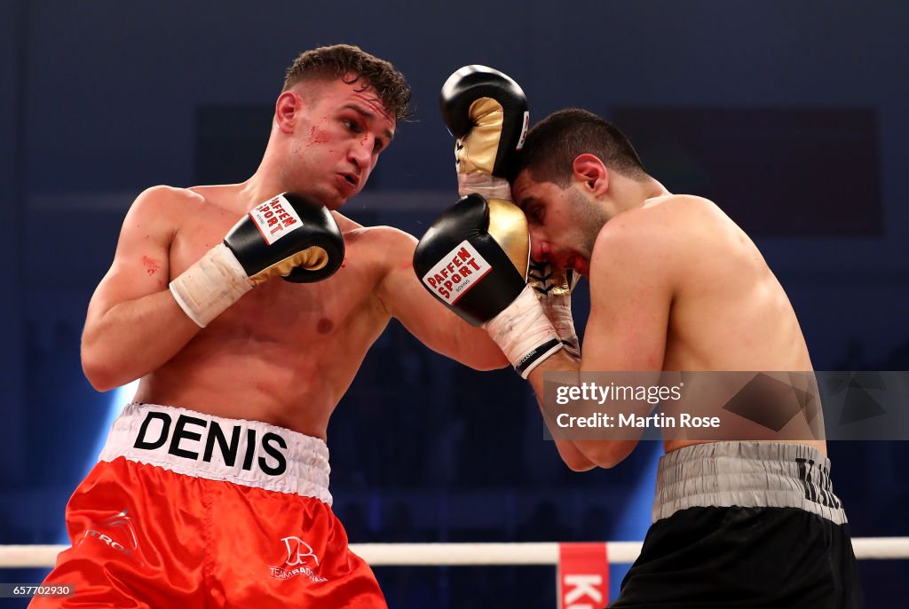 Rodavan Denis Rodavan of Germany and Atin Karabet of Germany exchange punches ...