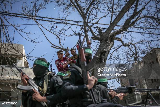 March 25, 2017 - Gaza City, Gaza Strip, Palestinian Territory - Members of the Ezzedine al-Qassam Brigades, the military wing of the Palestinian...