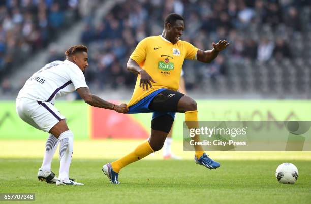 Left: Kevin-Prince Boateng during the farewell match of Marcelinho on march 25, 2017 in Berlin, Germany. Berlin, Germany, march 25, 2017: