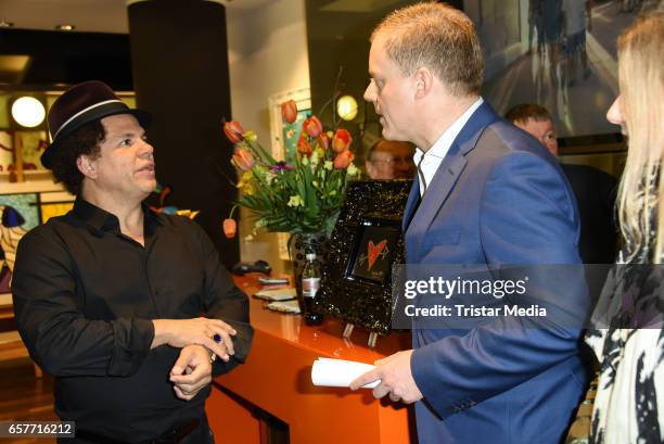 Artist Romero Britto and german moderator Marc Bartor during the Neo-Pop-Art exhibition of Romero Britto presented by Galery Mensing on March 25,...