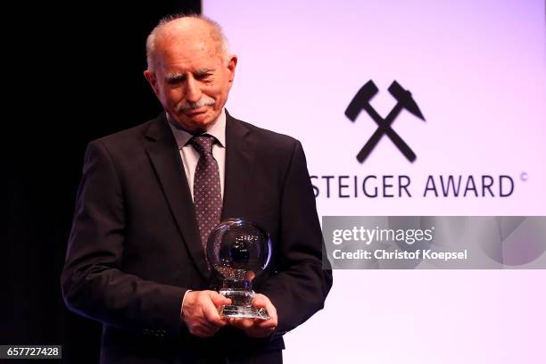 Sport commentator Werner Hansch reacts after winning the life's work award during the Steiger Award on at Coal Mine Hansemann "Alte Kaue" March 25,...