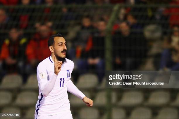 Kostas Mitroglou of Greece celebrates scoring his teams first goal of the game during the FIFA 2018 World Cup Group H Qualifier match between Belgium...