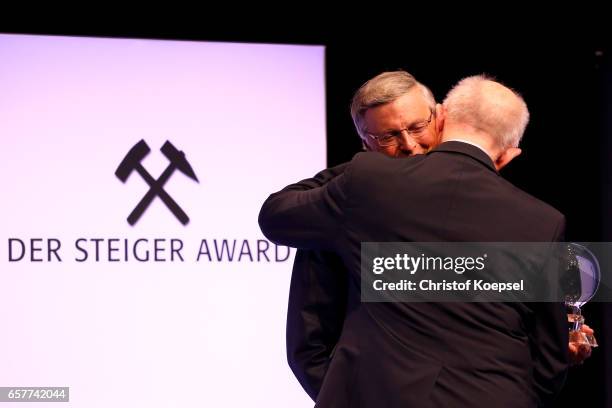 Wolfgang Bosbach, Member of the German Parliament embraces Werner Hansch for his life's work during the Steiger Award on at Coal Mine Hansemann "Alte...
