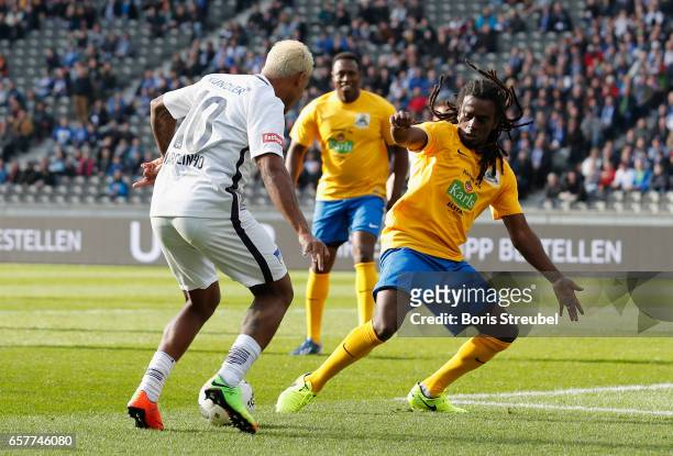 Marcelinho is challenged by Tinga during the Marcelinho testimonial match between a team of former Hertha BSC players and a team of brasilian players...