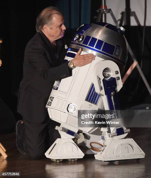 Todd Fisher and R2-D2 speaks at Debbie Reynolds and Carrie Fisher Memorial at Forest Lawn Cemetery on March 25, 2017 in Los Angeles, California.