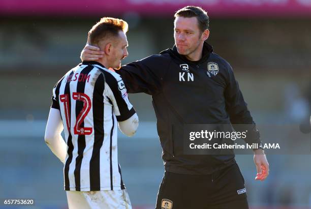 Kevin Nolan of manager Notts County with Robert Milsom of Notts County during the Sky Bet League Two match between Wycombe Wanderers and Notts County...