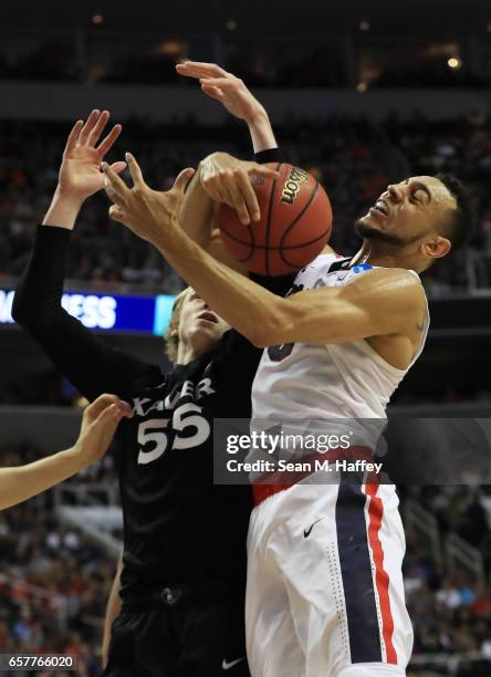 Nigel Williams-Goss of the Gonzaga Bulldogs rebounds against J.P. Macura of the Xavier Musketeers in the first half during the 2017 NCAA Men's...