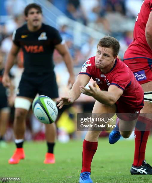 Izack Rodda, of Reds, passes from the ruck during the Super Rugby Rd 5 match between Jaguares and Reds at Jose Amalfitani Stadium on March 25, 2017...
