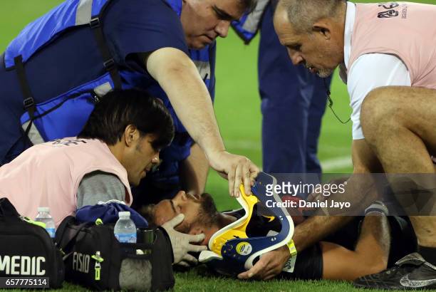 Bautista Ezcurra, of Jaguares, receives medical attention during the Super Rugby Rd 5 match between Jaguares and Reds at Jose Amalfitani Stadium on...