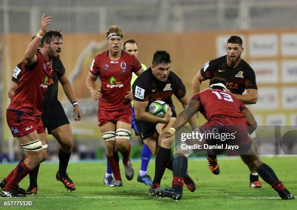 Pablo Matera, of Jaguares, cahrges into players of Reds during the Super Rugby Rd 5 match between Jaguares and Reds at Jose Amalfitani Stadium on...