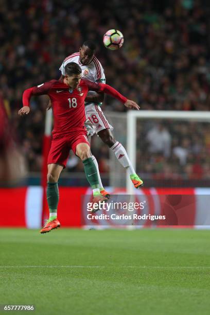Portugal's forward Andre Silva vies with Hungary's defender Paulo Vinicius during the match between Portugal and Hungary for FIFA 2018 World Cup...