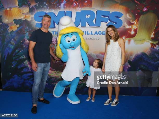 Luke Ricketson, daughter Sophia Ricketson and wife Kate Waterhouse arrive ahead of the SMURFS: The Lost Village Sydney Premiere on March 26, 2017 in...