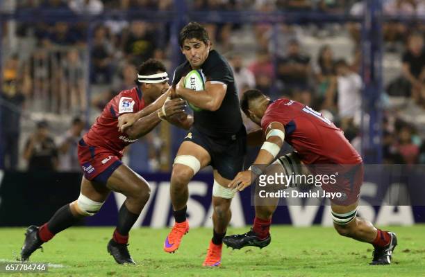 Pablo Matera, of Jaguares, is tackled during the Super Rugby Rd 5 match between Jaguares and Reds at Jose Amalfitani Stadium on March 25, 2017 in...