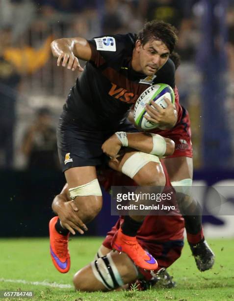 Pablo Matera, of Jaguares, is tackled during the Super Rugby Rd 5 match between Jaguares and Reds at Jose Amalfitani Stadium on March 25, 2017 in...