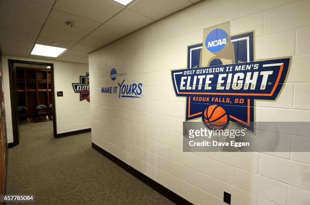 Logos are attached to the wall in the locker room prior to Fairmont State University taking on Northwest Missouri State University for the Division...