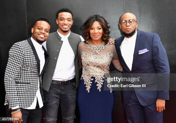 Nominee Travis Greene, singer Jonathan McReynolds, Cheryl Jackson, and recording artist Anthony Brown arrive at the 32nd annual Stellar Gospel Music...