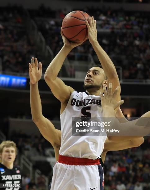 Nigel Williams-Goss of the Gonzaga Bulldogs attempts a shot against the Xavier Musketeers during the 2017 NCAA Men's Basketball Tournament West...