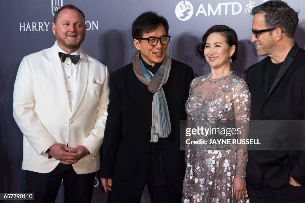 AmfAR CEO Kevin Robert Frost, actor Jackie Chan, casino owner Pansy Ho and designer Kenneth Cole pose on the red carpet during the 2017 American...