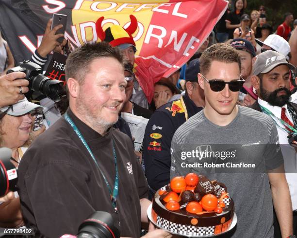 Stoffel Vandoorne of Belgium and McLaren Honda is greeted at the circuit with a birthday cake to celebrate his 24th birthday during the Australian...