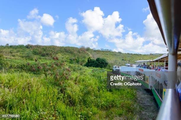 sight seeing train on the island of saint kitts. - ogphoto stock pictures, royalty-free photos & images