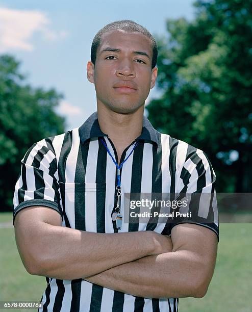 referee with crossed arms - referee stripes stock pictures, royalty-free photos & images