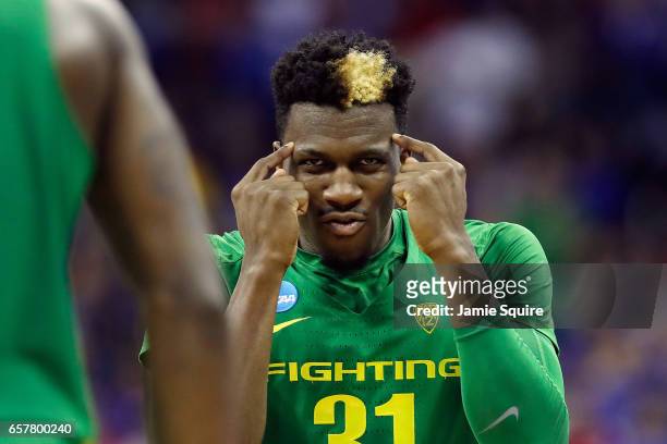 Dylan Ennis of the Oregon Ducks reacts in the first half against the Kansas Jayhawks during the 2017 NCAA Men's Basketball Tournament Midwest...