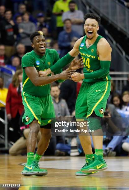 Dylan Ennis and Dillon Brooks of the Oregon Ducks react in the second half against the Kansas Jayhawks during the 2017 NCAA Men's Basketball...