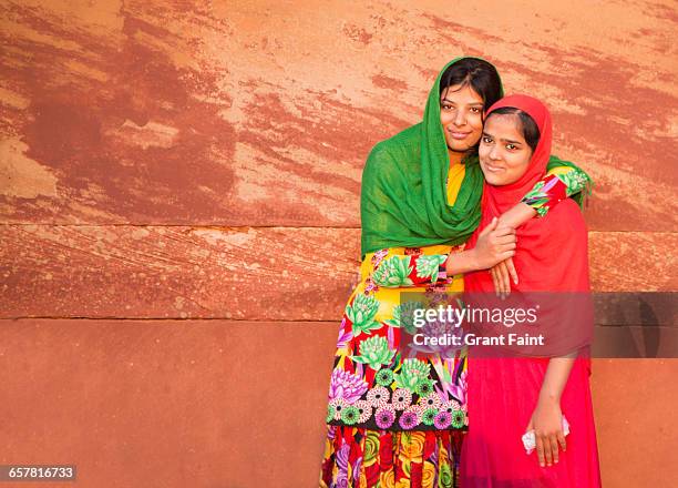 sisters. - jama masjid agra stock pictures, royalty-free photos & images