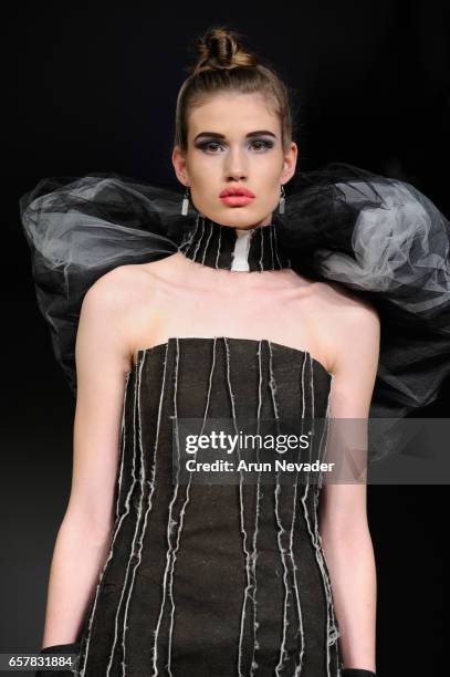 Model walks the runway wearing Jose Hendo at Vancouver Fashion Week Fall/Winter 2017 at Chinese Cultural Centre of Greater Vancouver on March 25,...