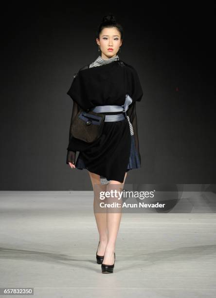 Model walks the runway wearing Jose Hendo at Vancouver Fashion Week Fall/Winter 2017 at Chinese Cultural Centre of Greater Vancouver on March 25,...