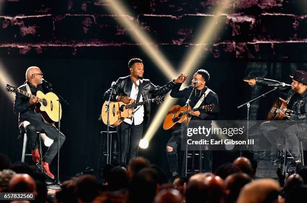 Musicians Jonathan McReynolds, Travis Greene, Jonathan Butler, and Israel Houghton perform during the 32nd annual Stellar Gospel Music Awards at the...