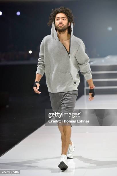 Noah Becker dressed in 's.Oliver Red Label' walks the runway for 's.Oliver THE FUSION COLLECTION Fashion Show' at Festhalle on March 25, 2017 in...