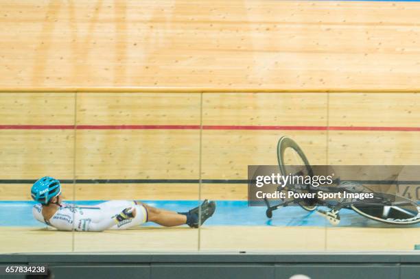 Chan Yik Ming Ricky of the X SPEED falls while competing in Men Junior - Omnium IV Points Race 20KM during the 2017 Hong Kong Track Cycling National...