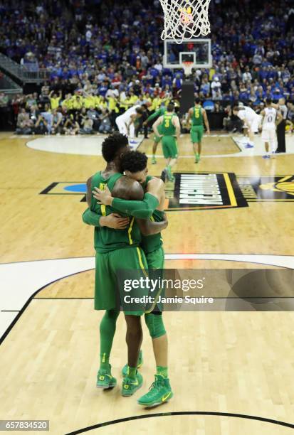 Jordan Bell and Dillon Brooks of the Oregon Ducks embrace at the end of the second half against the Kansas Jayhawks during the 2017 NCAA Men's...