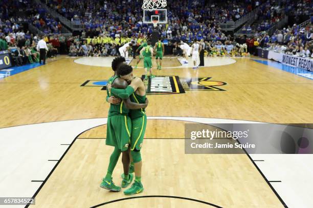 Jordan Bell and Dillon Brooks of the Oregon Ducks embrace at the end of the second half against the Kansas Jayhawks during the 2017 NCAA Men's...