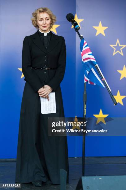 Priest Marie Elsa observes a minute of silence to pay tribute for the victims of Wednesday's terrorist attack in Westminster during Unite For Europe...