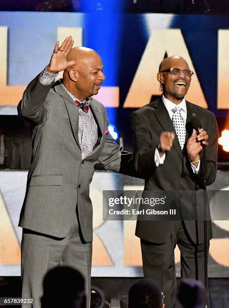 Spencer B. Taylor III stands onstage as Honoree Spencer Taylor Jr. Accepts the "James Cleveland Lifetime Achievement Award" during the 32nd annual...