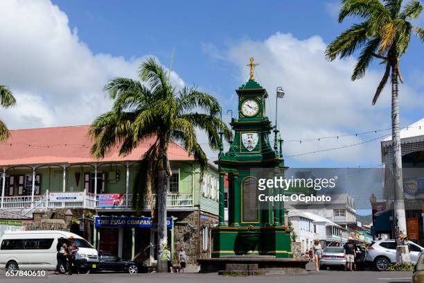 berkeley memorial clock in downtown basseterre, saint kitts - ogphoto stock pictures, royalty-free photos & images