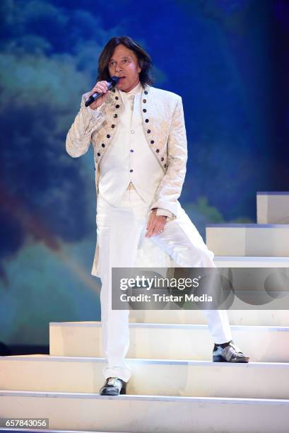 German singer Juergen Drews performs during the show 'Schlagercountdown - Das grosse Premierenfest' at EWE Arena on March 25, 2017 in Oldenburg,...